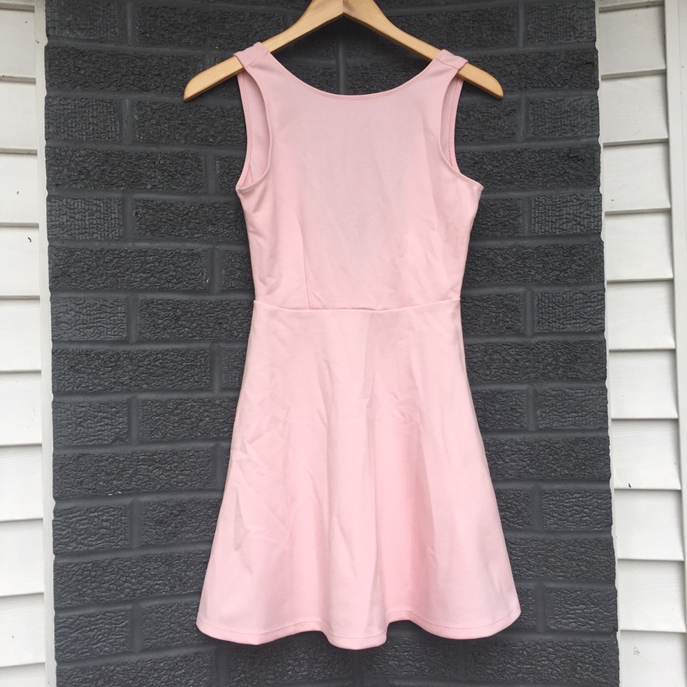 Light pink low cut back dress
